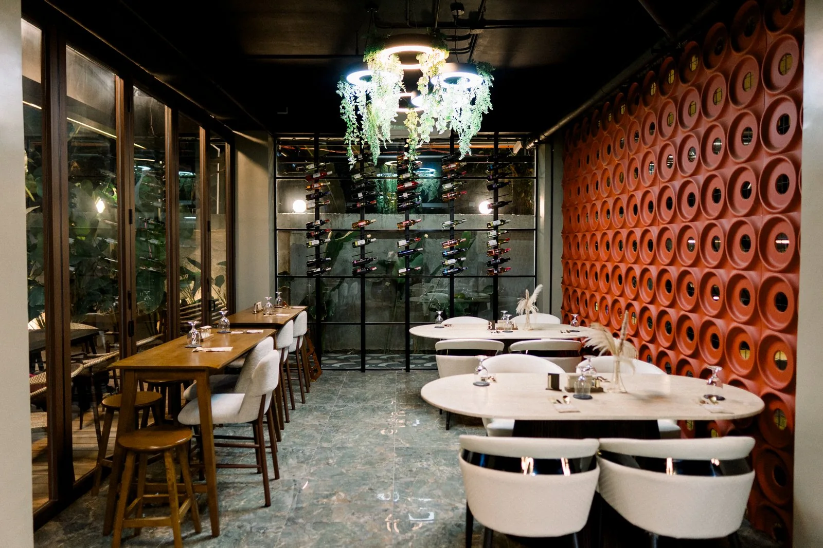 The warm, inviting interior of Maxine Dine at JMLAD Hotel